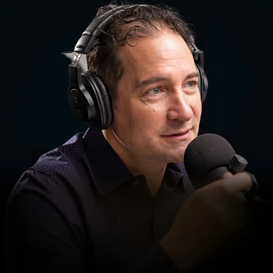 Unmask podcast cover art featuring Boaz Gilad