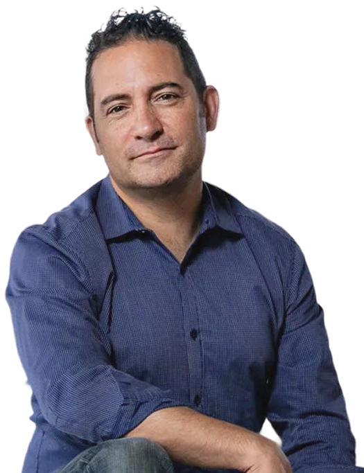 Portrait of Boaz Gilad in a blue shirt